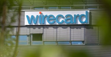 Der Wirecard-Schriftzug am Hauptquartier des Unternehmens in Bayern. Foto: Peter Kneffel/dpa