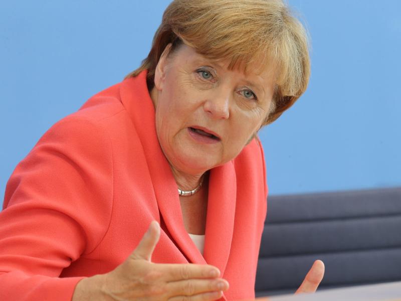 Bezeichnet die ansteigenden Zahlen von Corona-Infektionen in Deutschland als noch beherrschbar: Kanzlerin Merkel. Foto: Wolfgang Kumm/dpa