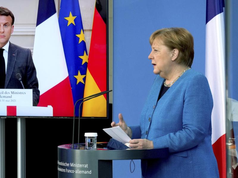 Emmanuel Macron und Angela Merkel sind bei der Spionage-Affäre einer Meinung. Foto: Michael Sohn/POOL AP/dpa