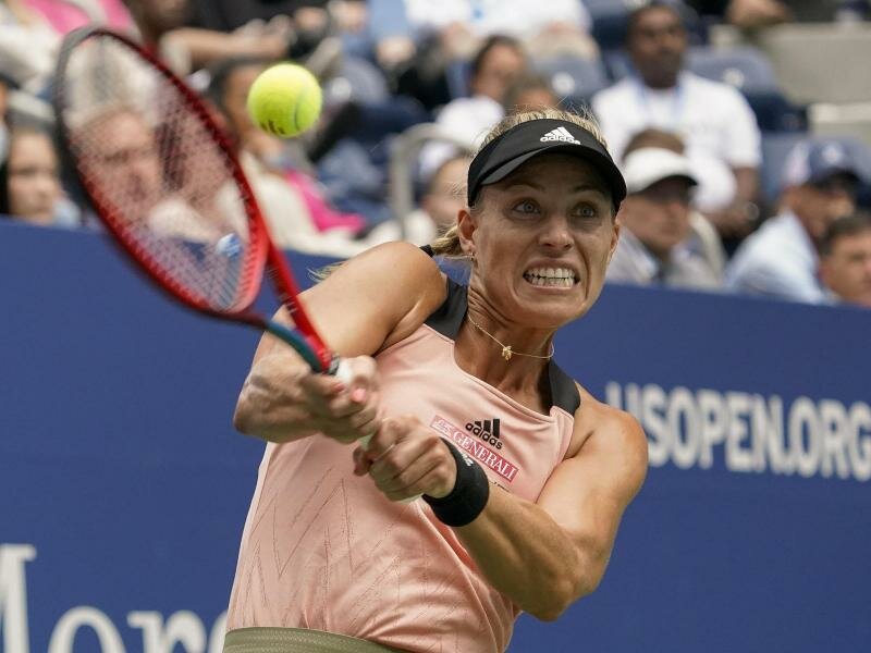 Angelique Kerber in Aktion und eine Runde weiter. Foto: Elise Amendola/AP/dpa
