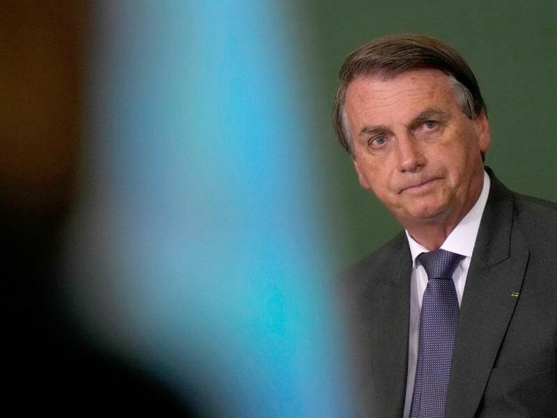 Täuschung, Anstiftung zu Straftaten, Verbrechen gegen die Menschlichkeit: Die Vorwürfe gegen&nbsp;Brasiliens Präsident Bolsonaro wiegen schwer. Foto: Eraldo Peres/AP/dpa