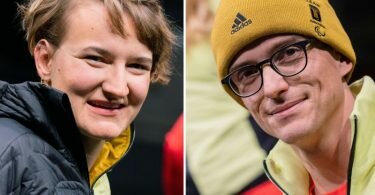 Anna-Lena Forster und Martin Fleig bei der Präsentation der Bekleidung Team Deutschland für die Winterspiele in Peking 2022. Foto: Rolf Vennenbernd/dpa