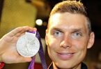 Tony Martin mit der olympischen Silbermedaille auf einer Aufnahme aus dem Jahre 2012. Foto: picture alliance / dpa