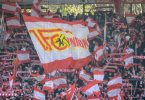 Fans von Union Berlin feuern ihr Team an. Foto: Andreas Gora/dpa