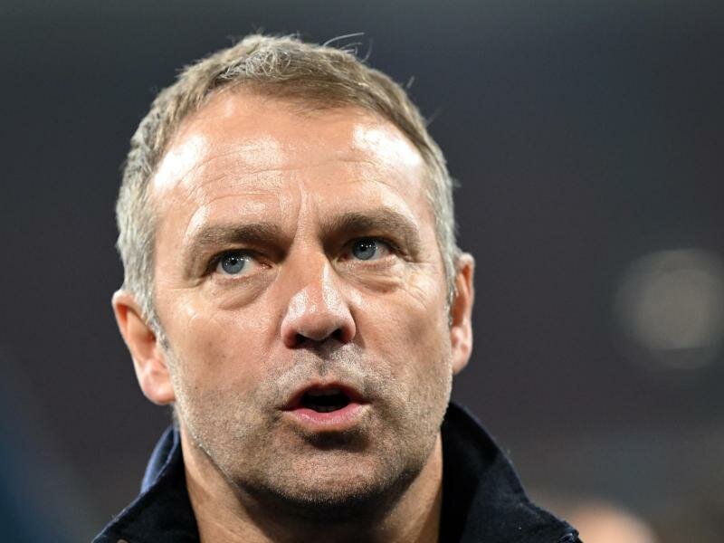 Will bei Florian Wirtz bezüglich der WM kein Risiko eingehen: Bundestrainer Hansi Flick. Foto: Federico Gambarini/dpa