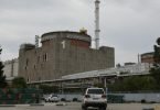 Eine Fahrzeugkolonne mit Mitgliedern der Internationalen Atomenergiebehörde (IAEA) trifft am 01.09.2022 im Kernkraftwerk Saporischschja ein. Foto: Victor/XinHua/dpa