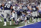 Dallas Cowboys Running Back Ezekiel Elliott (21) erzielt einen Touchdown. Foto: Adam Hunger/AP/dpa